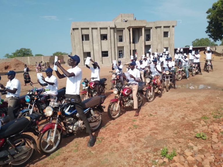 Motorcycle riders assemble for the campaign roadshow in Kuajok