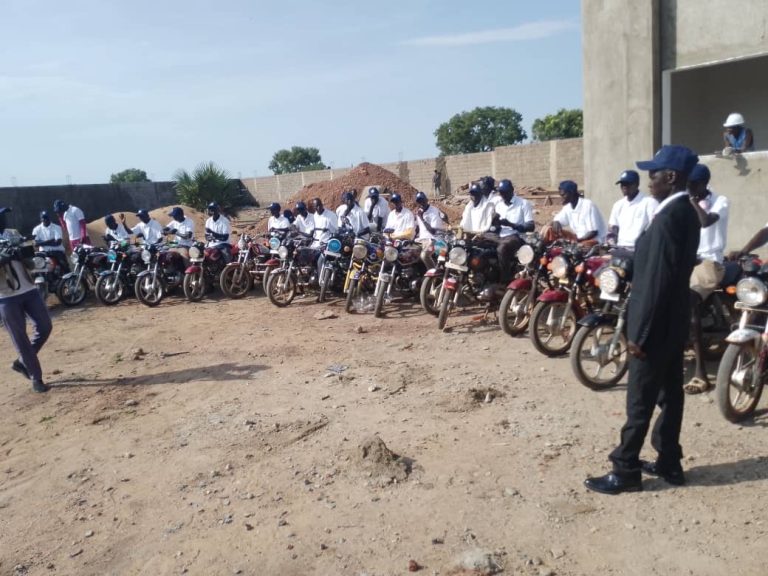 An official addresses the assembled riders
