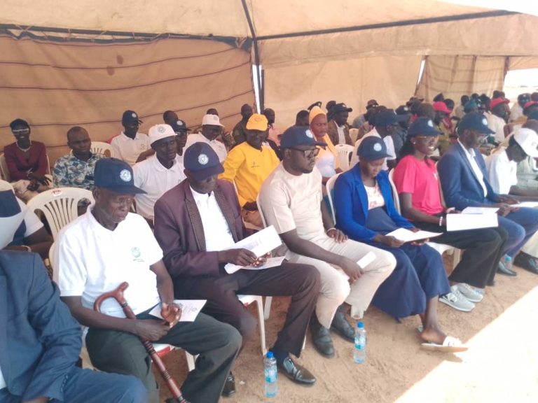 Participants follow the proceedings at the launch