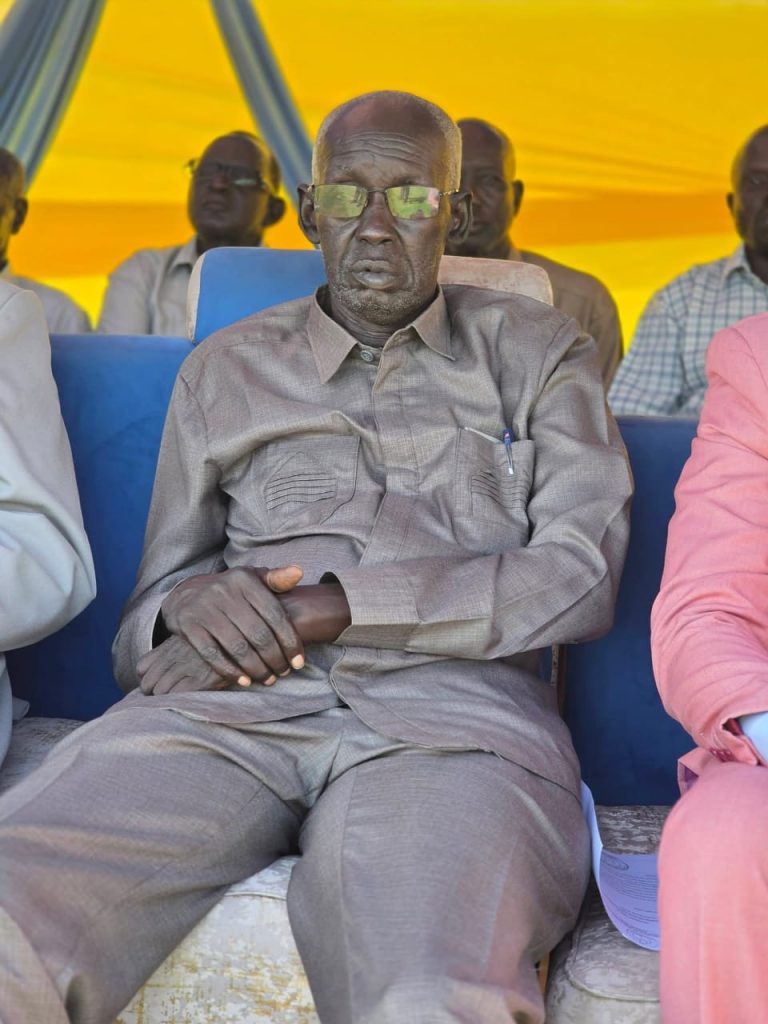 An invited guest follows the proceedings