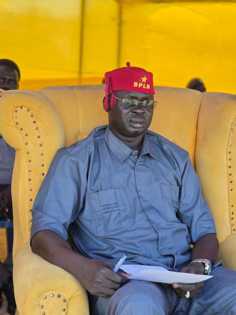 An official follows the proceedings at the launch