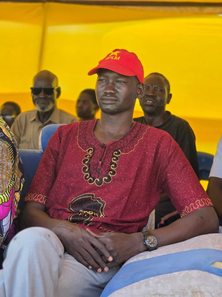 A participant seated at the launch