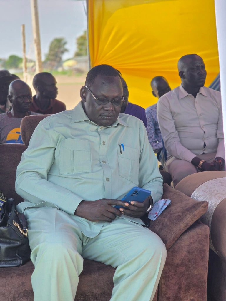 A participant follows the proceedings at the launch