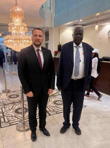 The Chairperson with a member of the Russian Delegation