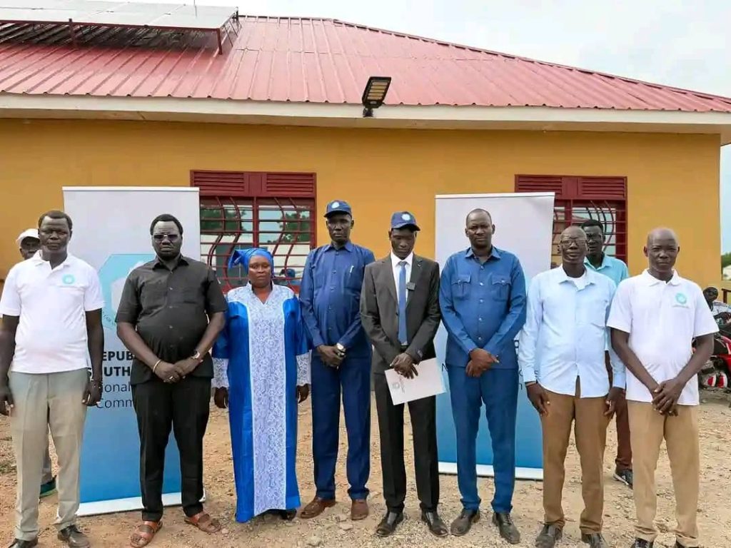 Officials and partners in a group photograph at the launch in Bentiu