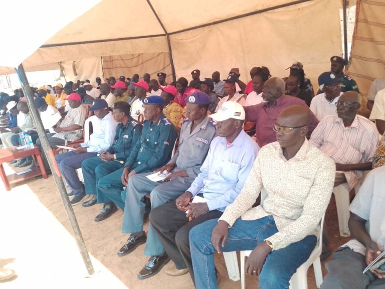 Invited guests and uniformed officers at the launch