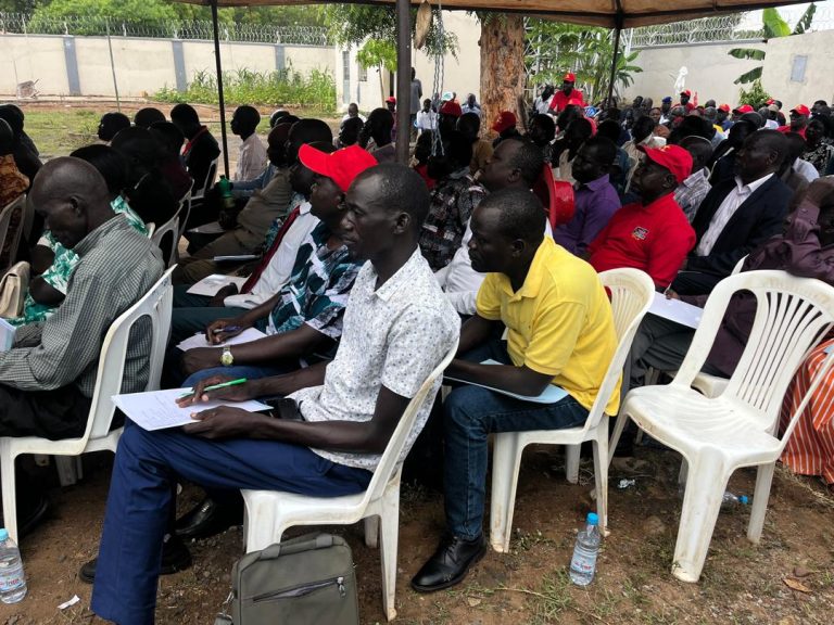 Participants taking notes during the proceedings