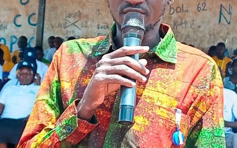 A speaker addresses the gathering
