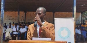 A speaker addresses participants at the launch