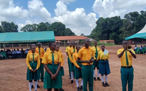Schoolchildren attend the launch ceremony