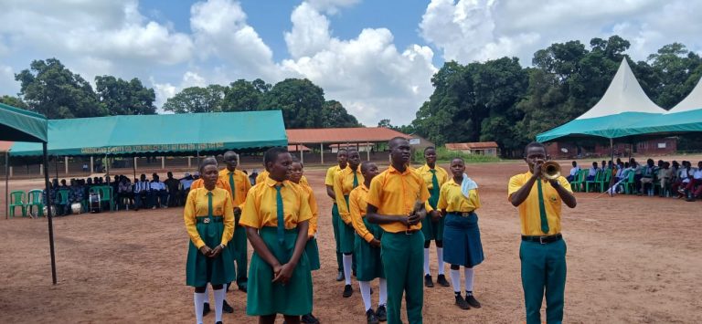 Schoolchildren attend the launch ceremony
