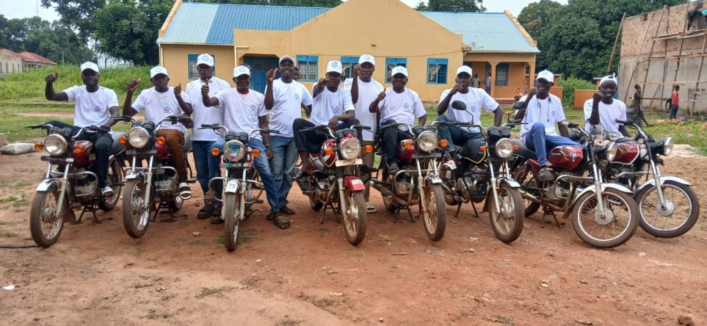 Voter educators with motorcycles at the launch of the campaign