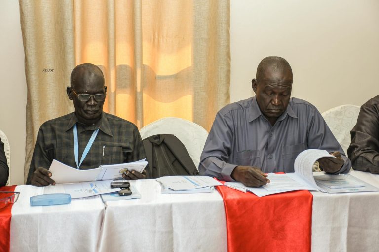 Participants read through the registration procedures