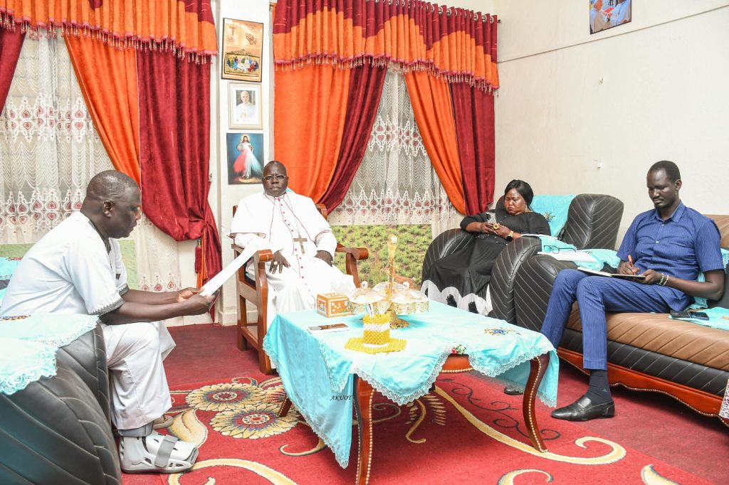The Chairperson of the Commission with His Eminence Cardinal Stephen Ameyu Martin Mulla and members of the Commission's delegation in Juba