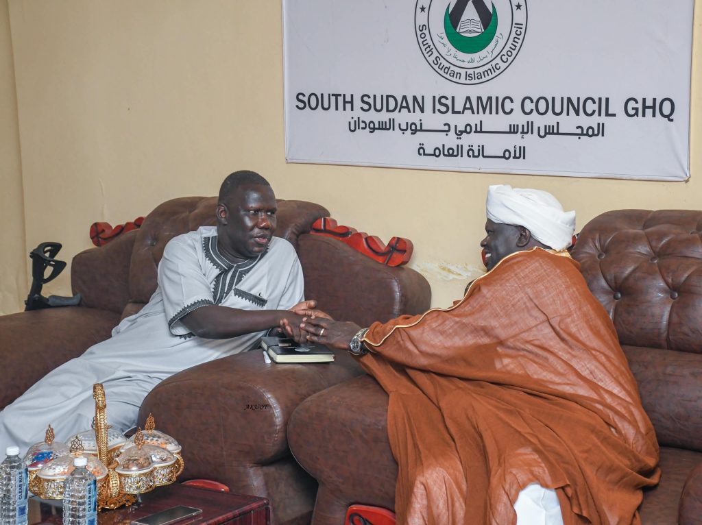 The Chairperson and His Eminence Sheikh Dr. Abdalla Barang Rwal at the close of the meeting